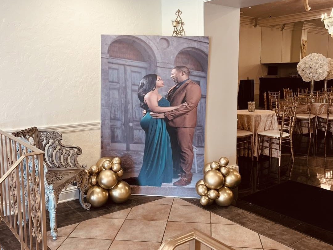 Large portrait photo board with gold balloon accents